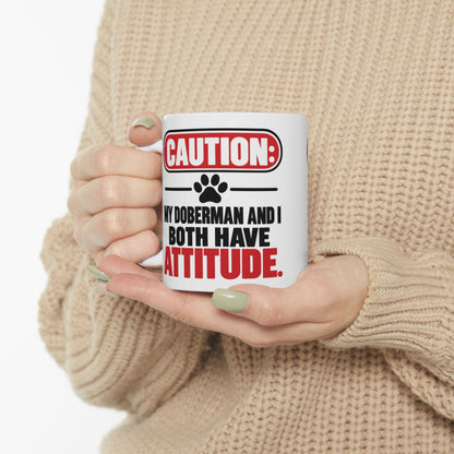 Caution My Doberman And I Both Have Attitude Ceramic Coffee Mug